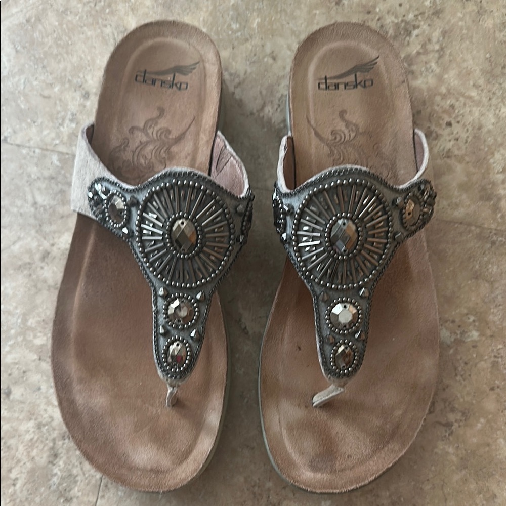 Dansko Sandals with Ergonomic Comfort. These are tan/beige sandals.